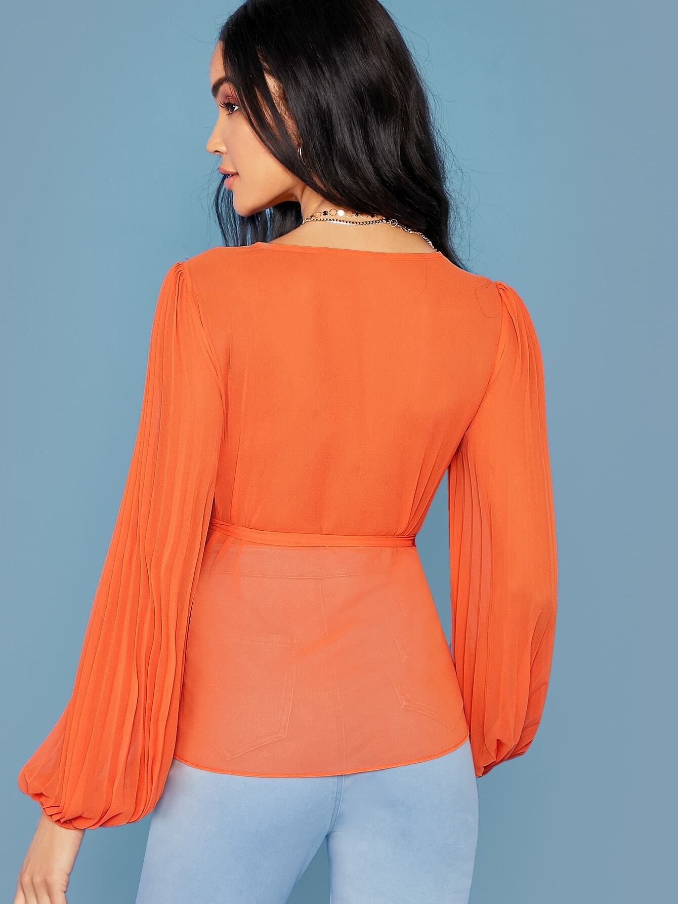 orange pleated top